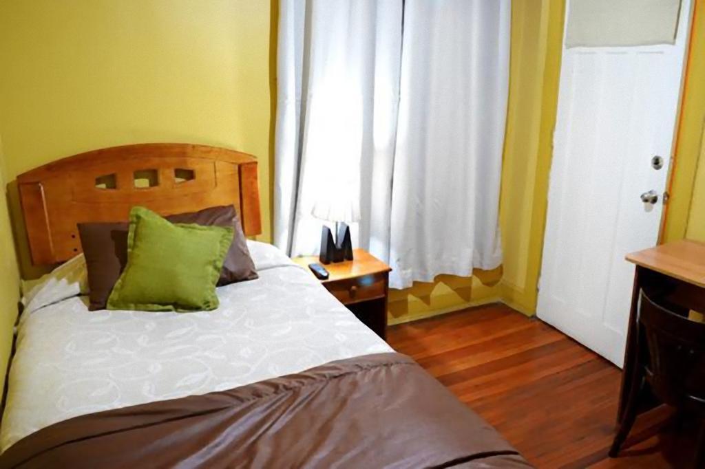 Hotel Almenas Santiago Quarto foto