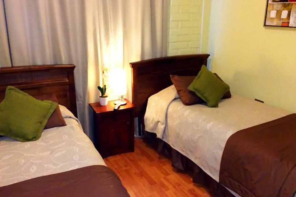 Hotel Almenas Santiago Quarto foto